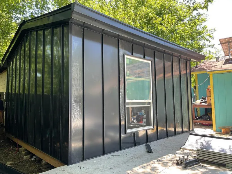 Black standing seam metal wall panels for Metal Roof Installation in Brookline